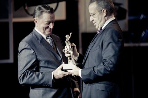 Estonian  President Toomas Hendrik Ilves hands the ‘Best Estonian Film of All Time Award’ to ‘Kevade’ director Arvo Kruusement